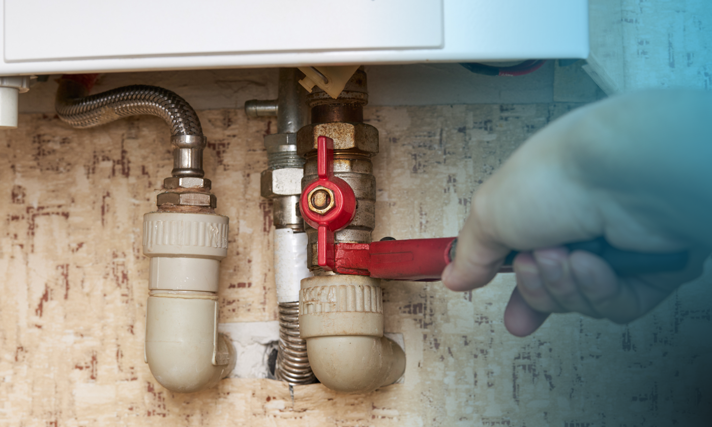 man fixing a natural gas appliance to follow natural gas safety tips